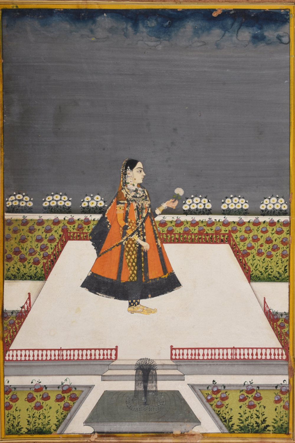 A Begum holding a flower I