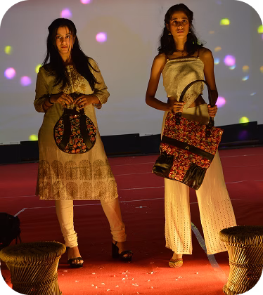 Model showcasing traditional Indian footwear on the designer runway